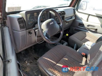 Zdjęcie 8 z 13 samochodu: 1997 JEEP WRANGLER / TJ SE VIN:1J4FY29P2VP412816 - miniatura