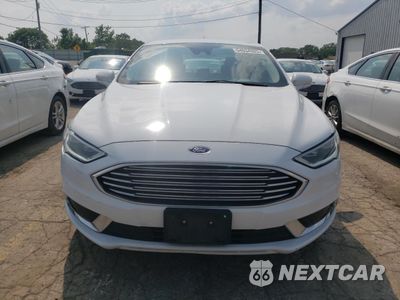 Piąte zdjęcie samochodu w środku: 2018 FORD FUSION SE HYBRID VIN:3FA6P0LU2JR118725 - miniatura
