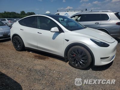 Czwarte zdjęcie samochodu z boku: 2022 TESLA MODEL Y VIN:7SAYGDEF2NF540058 - miniatura