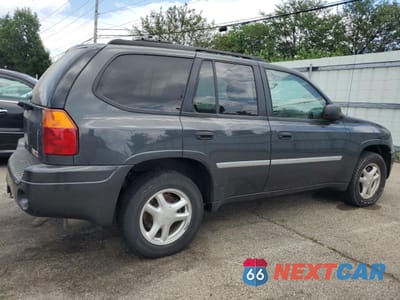 Trzecie zdjęcie samochodu z tyłu: 2007 GMC ENVOY VIN:1GKDS13SX72177351 - miniatura