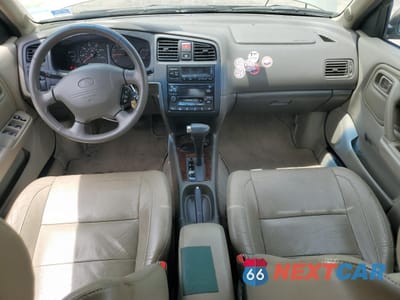 Zdjęcie 8 z 12 samochodu: 2002 INFINITI G20 VIN:JNKCP11A62T511511 - miniatura