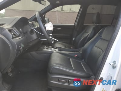 Zdjęcie 7 z 16 samochodu: 2023 HONDA PASSPORT EXL VIN:5FNYF8H55PB010292 - miniatura