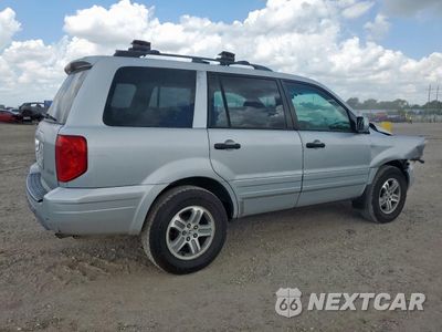 Trzecie zdjęcie samochodu z tyłu: 2003 HONDA PILOT EXL VIN:2HKYF18583H556782 - miniatura