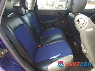 Zdjęcie 10 z 12 samochodu: 2003 FORD FOCUS ZX5 VIN:3FAHP37513R145320 - miniatura