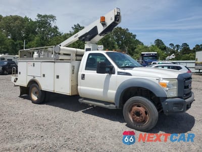 Czwarte zdjęcie samochodu z boku: 2014 FORD F450 SUPER DUTY VIN:1FDUF4GY8EEA62545 - miniatura