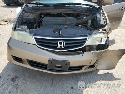 Zdjęcie 12 z 15 samochodu: 2004 HONDA ODYSSEY EXL VIN:5FNRL18984B017207 - miniatura