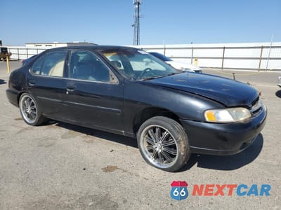 Czwarte zdjęcie samochodu z boku: 1999 NISSAN ALTIMA XE VIN:1N4DL01D1XC143886 - miniatura
