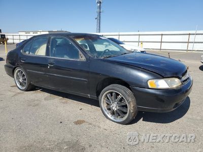 Czwarte zdjęcie samochodu z boku: 1999 NISSAN ALTIMA XE VIN:1N4DL01D1XC143886 - miniatura
