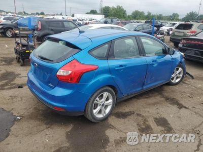 Trzecie zdjęcie samochodu z tyłu: 2014 FORD FOCUS SE VIN:1FADP3K22EL428550 - miniatura