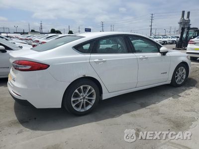 Trzecie zdjęcie samochodu z tyłu: 2019 FORD FUSION SE VIN:3FA6P0LU3KR124857 - miniatura