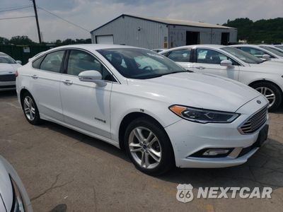Czwarte zdjęcie samochodu z boku: 2017 FORD FUSION SE HYBRID VIN:3FA6P0LU1HR410067 - miniatura