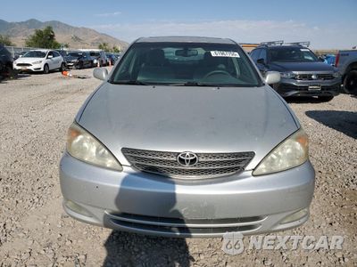 Piąte zdjęcie samochodu w środku: 2003 TOYOTA CAMRY LE VIN:4T1BE30K13U683025 - miniatura