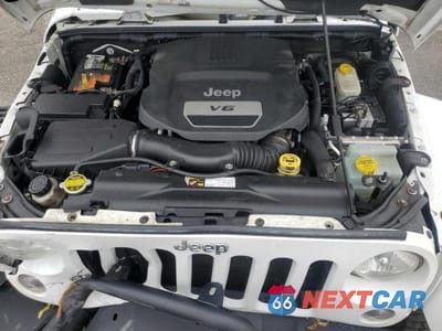 Zdjęcie 12 z 14 samochodu: 2015 JEEP WRANGLER UNLIMITED SAHARA VIN:1C4HJWEG6FL561285 - miniatura