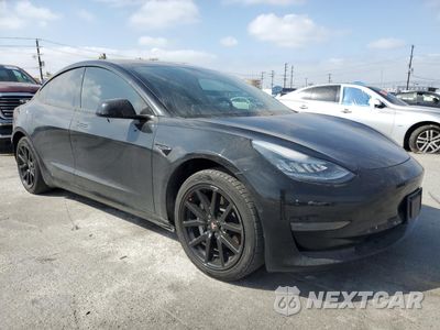 Czwarte zdjęcie samochodu z boku: 2020 TESLA MODEL 3 VIN:5YJ3E1EA8LF704426 - miniatura