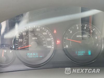Zdjęcie 9 z 13 samochodu: 2006 JEEP GRAND CHEROKEE LAREDO VIN:1J4GR48K36C220607 - miniatura