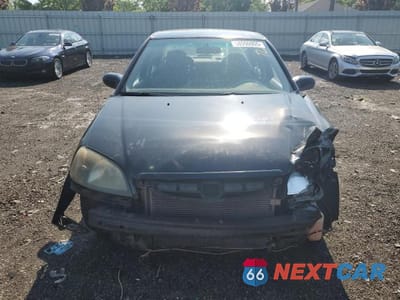 Piąte zdjęcie samochodu w środku: 2002 HONDA CIVIC LX VIN:2HGES155X2H500273 - miniatura