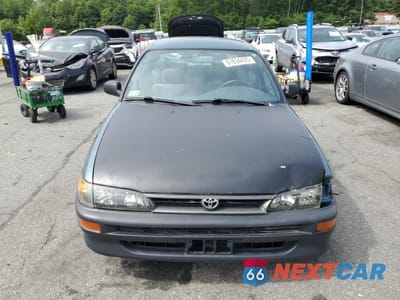 Piąte zdjęcie samochodu w środku: 1995 TOYOTA COROLLA LE VIN:2T1AE09B9SC125940 - miniatura