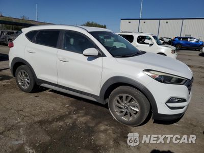 Czwarte zdjęcie samochodu z boku: 2017 HYUNDAI TUCSON LIMITED VIN:KM8J33A42HU450327 - miniatura