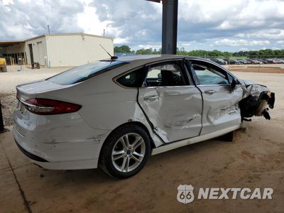 Trzecie zdjęcie samochodu z tyłu: 2018 FORD FUSION SE HYBRID VIN:3FA6P0LU9JR129933 - miniatura