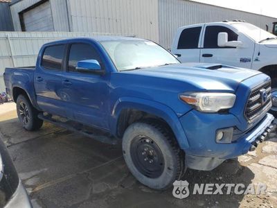 Czwarte zdjęcie samochodu z boku: 2016 TOYOTA TACOMA DOUBLE CAB VIN:3TMAZ5CN7GM005976 - miniatura