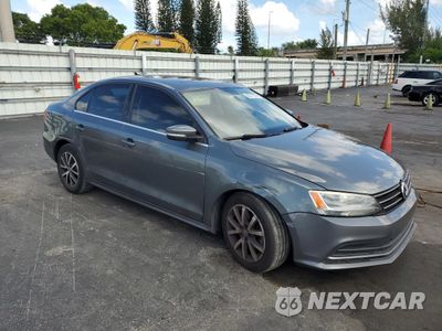 Czwarte zdjęcie samochodu z boku: 2017 VOLKSWAGEN JETTA SE VIN:3VWDB7AJ1HM248789 - miniatura