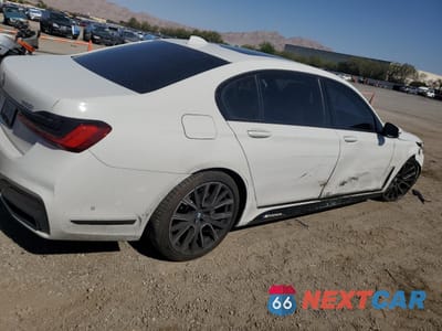 Trzecie zdjęcie samochodu z tyłu: 2020 BMW 740 I VIN:WBA7T2C03LGF96603 - miniatura