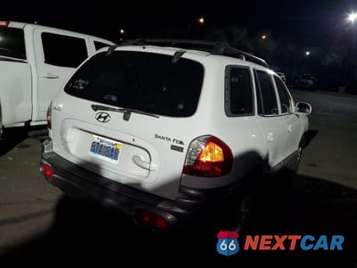 Trzecie zdjęcie samochodu z tyłu: 2004 HYUNDAI SANTA FE GLS VIN:KM8SC13E84U713106 - miniatura