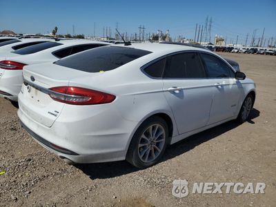 Trzecie zdjęcie samochodu z tyłu: 2017 FORD FUSION SE HYBRID VIN:3FA6P0LU7HR409165 - miniatura