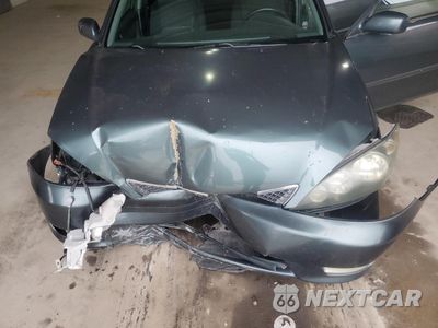 Zdjęcie 11 z 14 samochodu: 2005 TOYOTA CAMRY LE VIN:4T1BE32K35U011838 - miniatura
