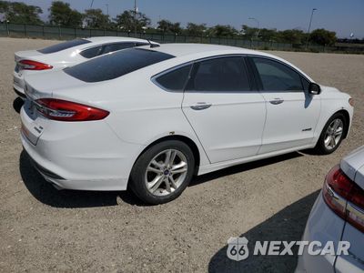 Trzecie zdjęcie samochodu z tyłu: 2018 FORD FUSION SE HYBRID VIN:3FA6P0LU8JR281864 - miniatura