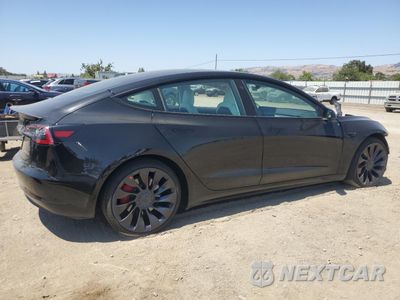 Trzecie zdjęcie samochodu z tyłu: 2021 TESLA MODEL 3 VIN:5YJ3E1EC6MF936204 - miniatura