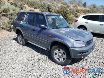 Czwarte zdjęcie samochodu z boku: 1996 TOYOTA RAV4 VIN:JT3HP10V6T0090702 - miniatura