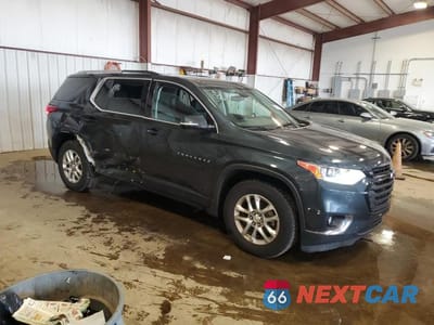 Czwarte zdjęcie samochodu z boku: 2018 CHEVROLET TRAVERSE VIN:1GNEVGKW5JJ217483 - miniatura
