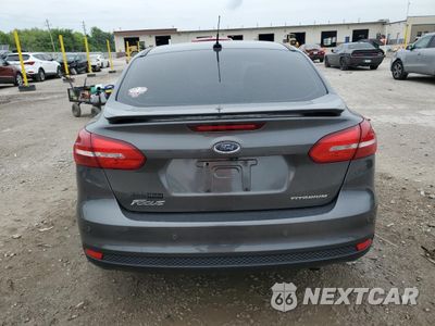 Zdjęcie 6 z 15 samochodu: 2015 FORD FOCUS TITANIUM VIN:1FADP3J27FL259029 - miniatura