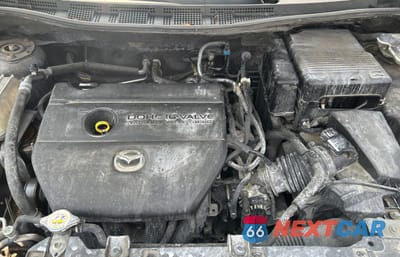 Zdjęcie 7 z 11 samochodu: 2012 MAZDA 5 VIN:JM1CW2CL2C0107908 - miniatura