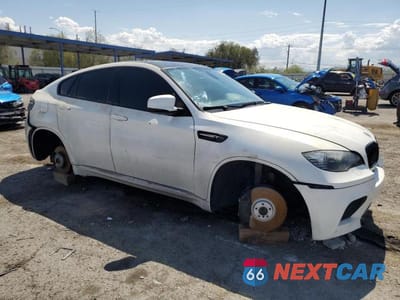 Czwarte zdjęcie samochodu z boku: 2011 BMW X6 M VIN:5YMGZ0C55BLK14003 - miniatura