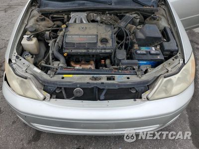 Zdjęcie 11 z 15 samochodu: 2000 TOYOTA AVALON XL VIN:4T1BF28BXYU112085 - miniatura