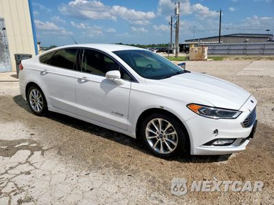 Czwarte zdjęcie samochodu z boku: 2017 FORD FUSION SE HYBRID VIN:3FA6P0LU6HR409030 - miniatura