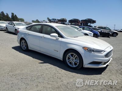 Czwarte zdjęcie samochodu z boku: 2018 FORD FUSION SE HYBRID VIN:3FA6P0LU1JR171562 - miniatura