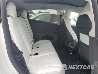 Zdjęcie 10 z 12 samochodu: 2023 TESLA MODEL Y VIN:7SAYGDEE7PA141699 - miniatura