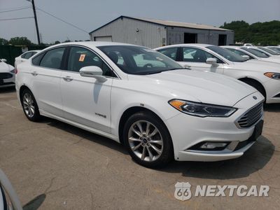 Czwarte zdjęcie samochodu z boku: 2017 FORD FUSION SE HYBRID VIN:3FA6P0LU4HR409088 - miniatura