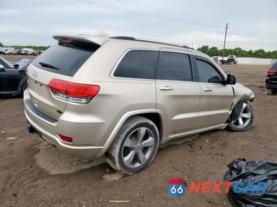 Trzecie zdjęcie samochodu z tyłu: 2014 JEEP GRAND CHEROKEE OVERLAND VIN:1C4RJECT3EC281403 - miniatura