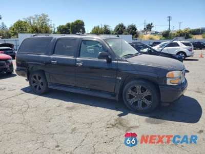 Czwarte zdjęcie samochodu z boku: 2006 GMC YUKON XL DENALI VIN:1GKFK66U76J127207 - miniatura