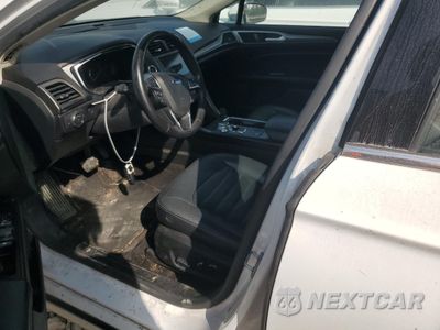 Zdjęcie 7 z 12 samochodu: 2018 FORD FUSION SE HYBRID VIN:3FA6P0LU5JR118685 - miniatura