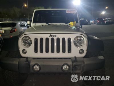 Piąte zdjęcie samochodu w środku: 2016 JEEP WRANGLER UNLIMITED SPORT VIN:1C4BJWDG2GL179926 - miniatura