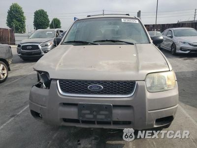 Piąte zdjęcie samochodu w środku: 2001 FORD ESCAPE XLT VIN:1FMYU03181KE78292 - miniatura