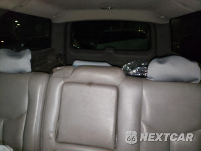 Zdjęcie 10 z 13 samochodu: 2003 GMC YUKON XL C1500 VIN:1GKEC16T83J141390 - miniatura
