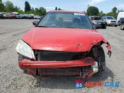 Piąte zdjęcie samochodu w środku: 2005 HONDA CIVIC LX VIN:1HGEM22595L052992 - miniatura