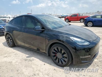 Czwarte zdjęcie samochodu z boku: 2023 TESLA MODEL Y VIN:7SAYGDEF7PF675037 - miniatura