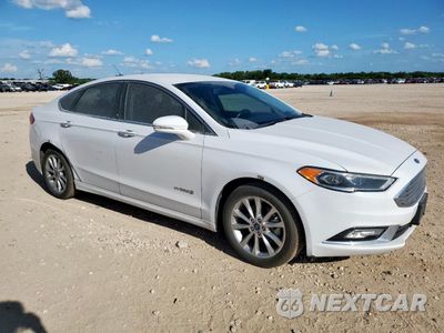 Czwarte zdjęcie samochodu z boku: 2017 FORD FUSION SE HYBRID VIN:3FA6P0LU6HR408993 - miniatura